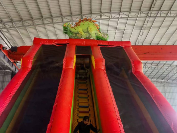 Надувная горка "Динолэнд" 15*12*10 м