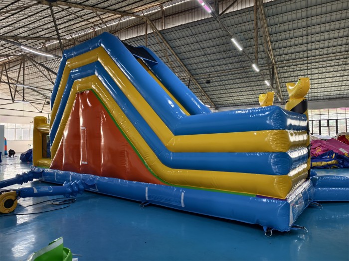 Надувная горка "Миньоны в лесу" 9*4*4,5 м