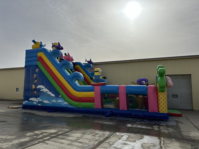 Надувной батут "Миньоны на волнах 3" 14*8*8,4 м 