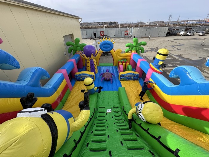 Надувной батут "Миньоны на волнах 3" 14*8*8,4 м 