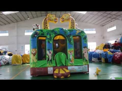 Надувной батут с горкой "Законы джунглей" 6*4*4 м