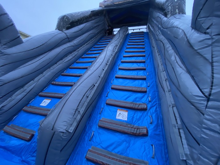 Надувная зимняя горка "Экстрим в джунглях" 27*4,5*9,3 м